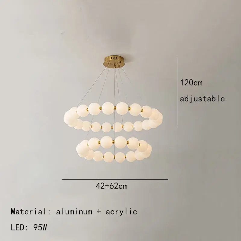 Modern brass led pendant light featuring a double-ring design with frosted acrylic spheres and gold-toned aluminum decorbites brass led