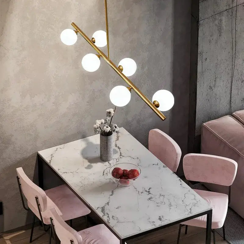Modern brass led pendant lights with gold-toned spherical bulbs in a branching design for dining room decorbites brass led chandelier