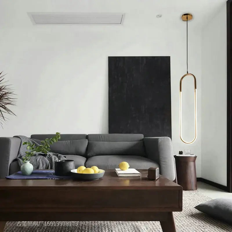 Modern brass led u-shaped bar chandelier gold-toned oval pendant light with sleek minimalist design for dining room