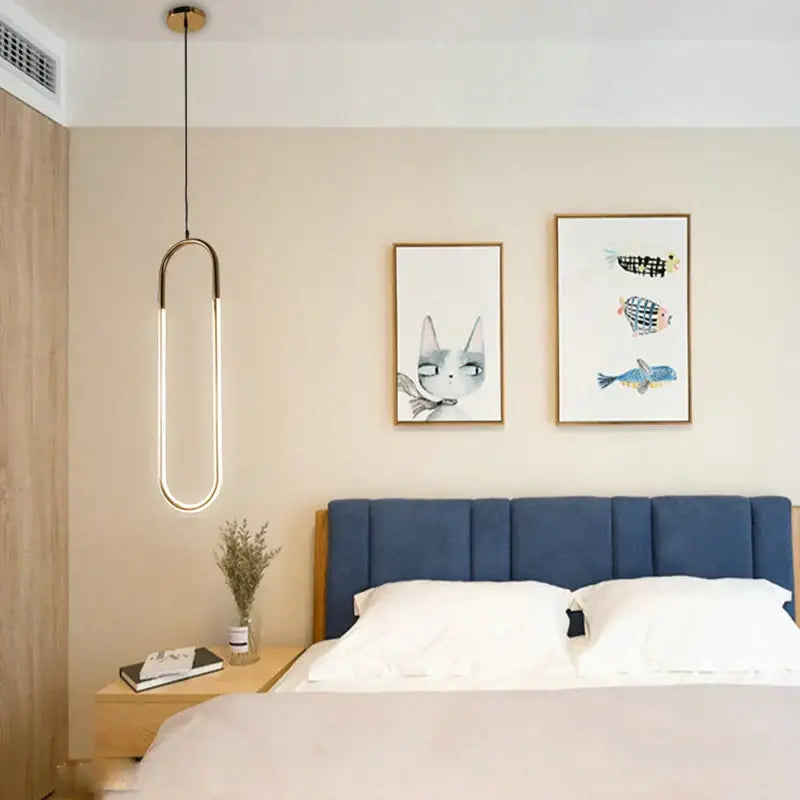 Modern brass led u-shaped bar chandelier with a sleek oval pendant light and warm illumination for dining room use