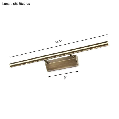 Modern brass led wall mounted light fixture with brass finish, rectangular base, and embedded bulbs for bathroom vanity lighting