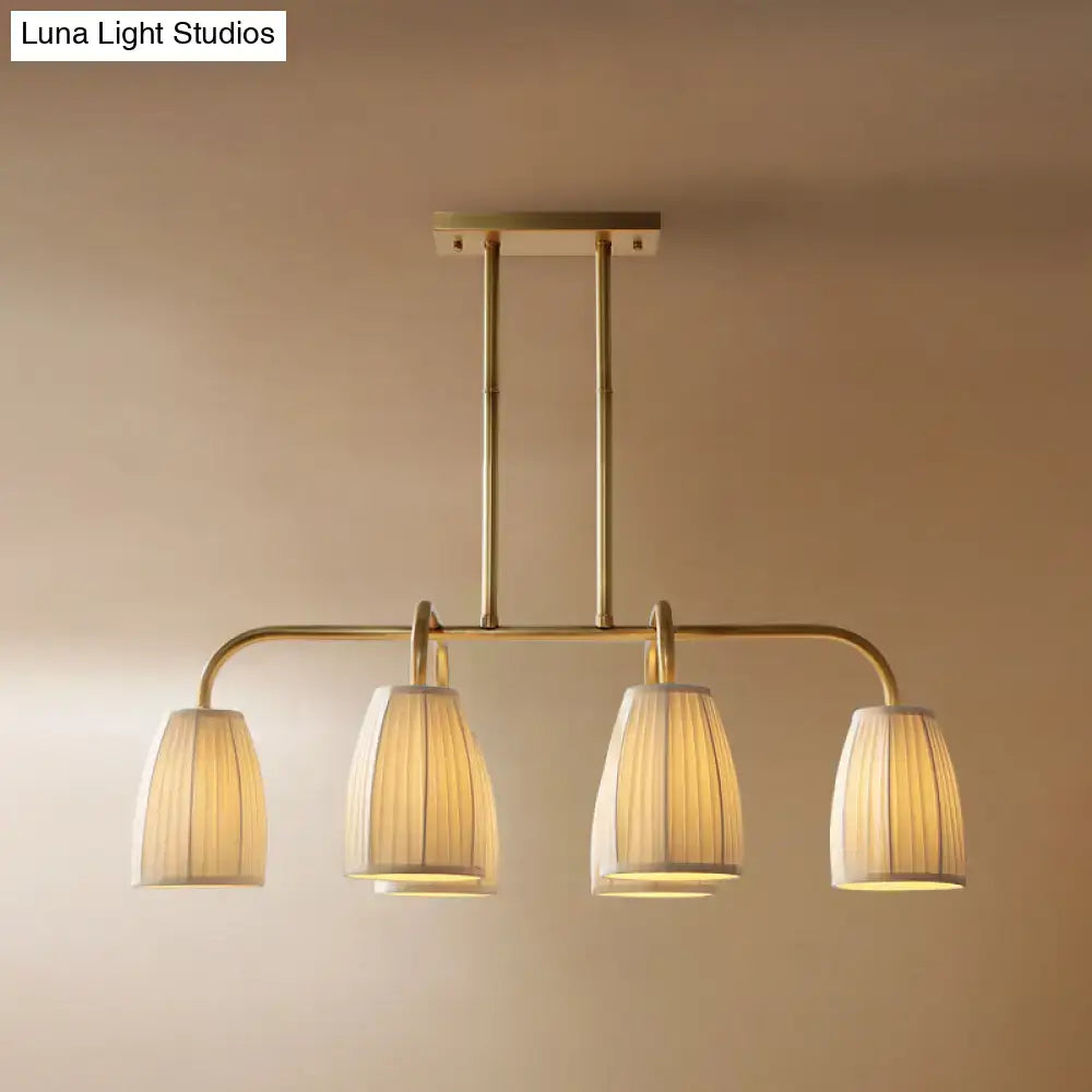 Brass-finished decorbites™ rustic pleated fabric pendant chandelier with four off-white shades for dining table lighting