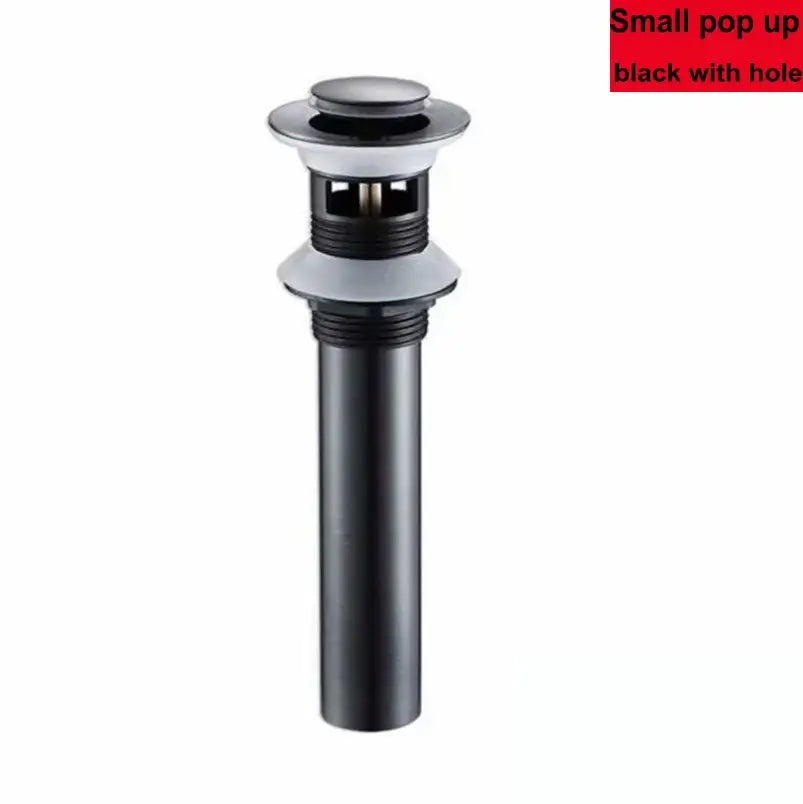 Modern brass pop up drain by decorbites featuring a black cylindrical body and silver-toned top mechanism for bathroom sinks