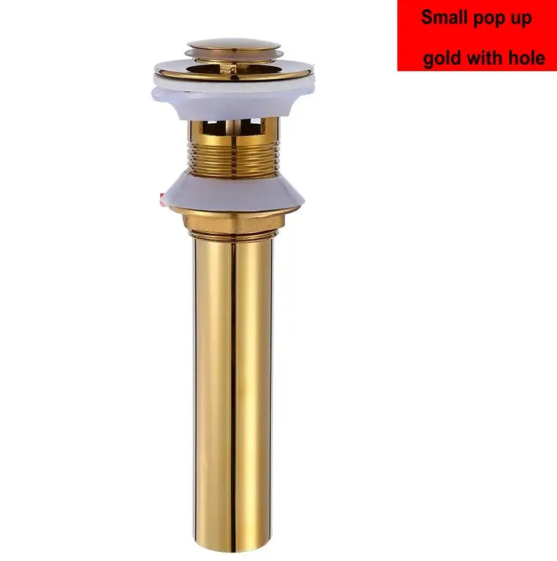 Modern brass pop up drain in gold with white plastic top and threaded metal body for bathroom sinks by decorbites brass pop