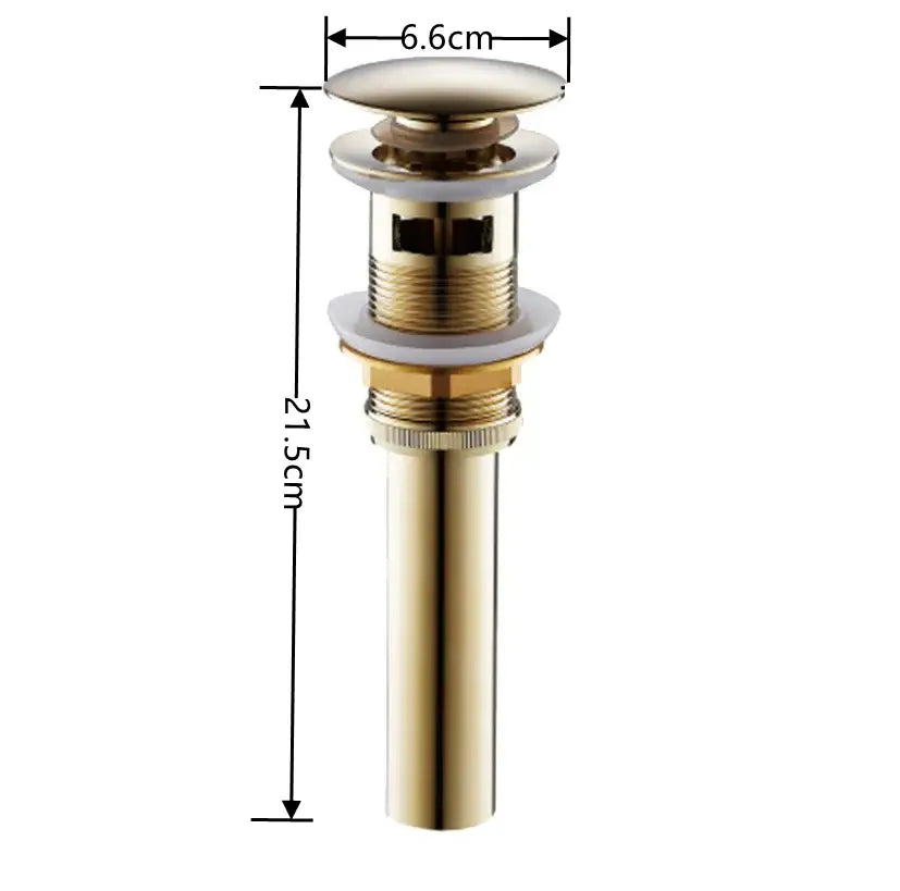 Modern brass pop up drain for bathroom sink featuring a gold-toned brass pop with sleek cylindrical body and flat top