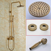 Modern brass rainfall shower faucet set with wall-mounted rainhead handheld spray and decorative circular base plates