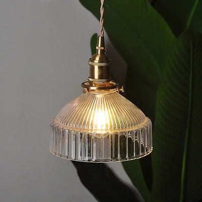Modern brass ribbed clear glass pendant lamp with warm glow for dining room decorbites clear glass lighting