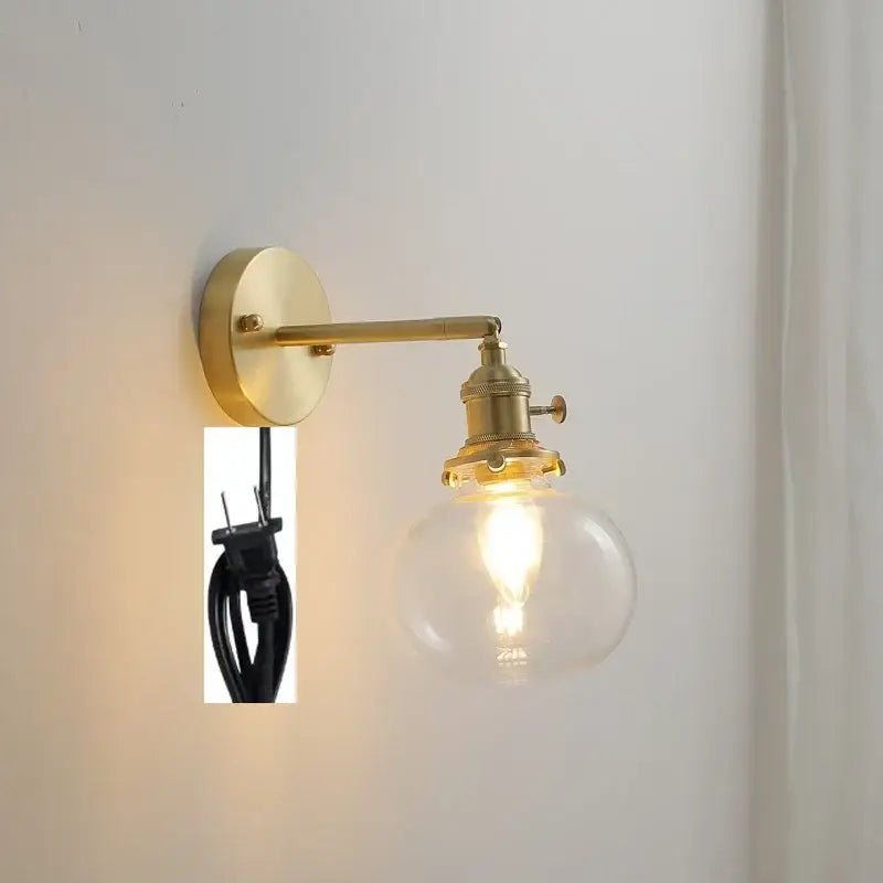 Modern brass ribbed glass ball wall sconce with brass finish and exposed filament bulb for bedroom decorbites glass ball wall