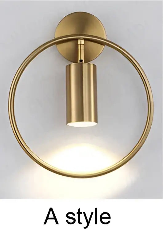 Modern brass ring led wall sconce with cylindrical light fixture in brass finish for bedroom decorbites brass ring led lighting