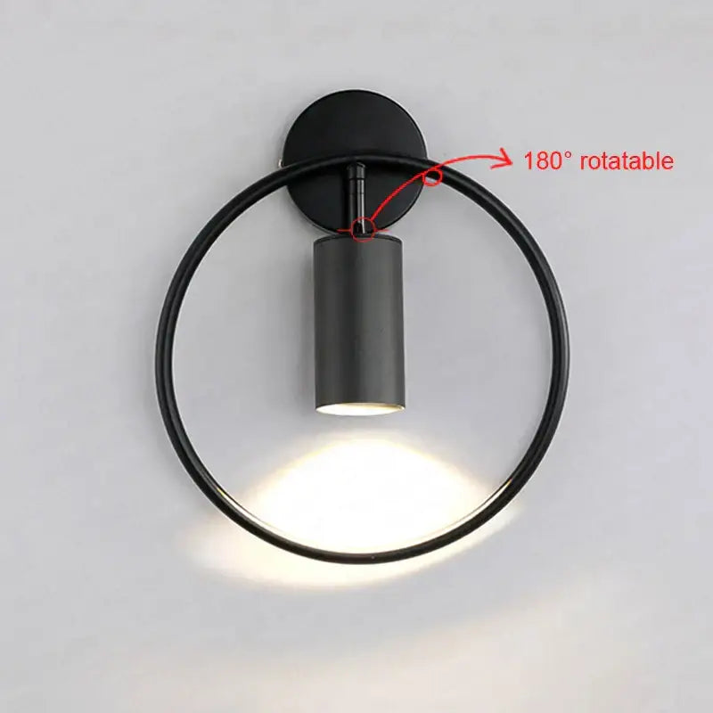 Black brass ring led wall sconce with cylindrical fixture and 180° rotatable design for modern decorbites brass ring lighting