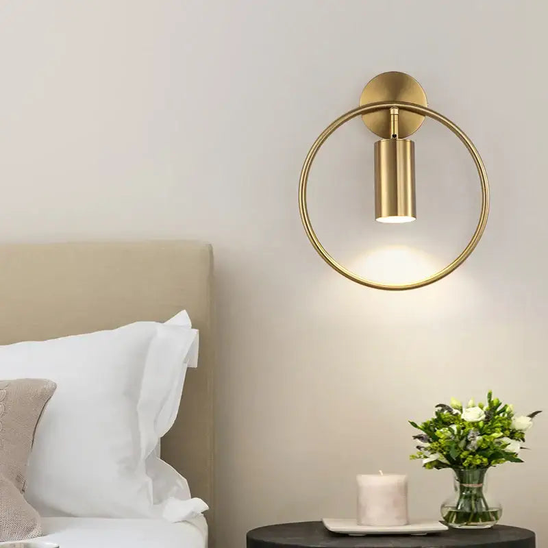 Modern brass ring led wall sconce with a gold circular brass ring led fixture ideal for bedroom decorbites brass ring design