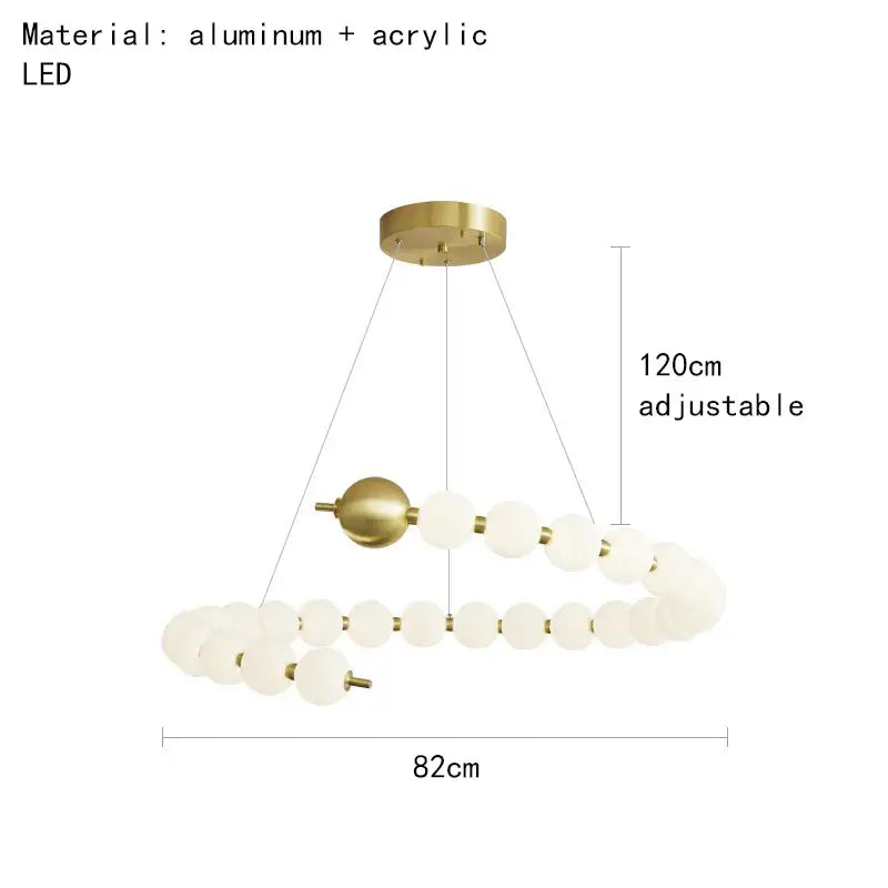 Modern brass round led pendant lights featuring adjustable height and frosted acrylic bead chandelier for dining room decorbites brass round