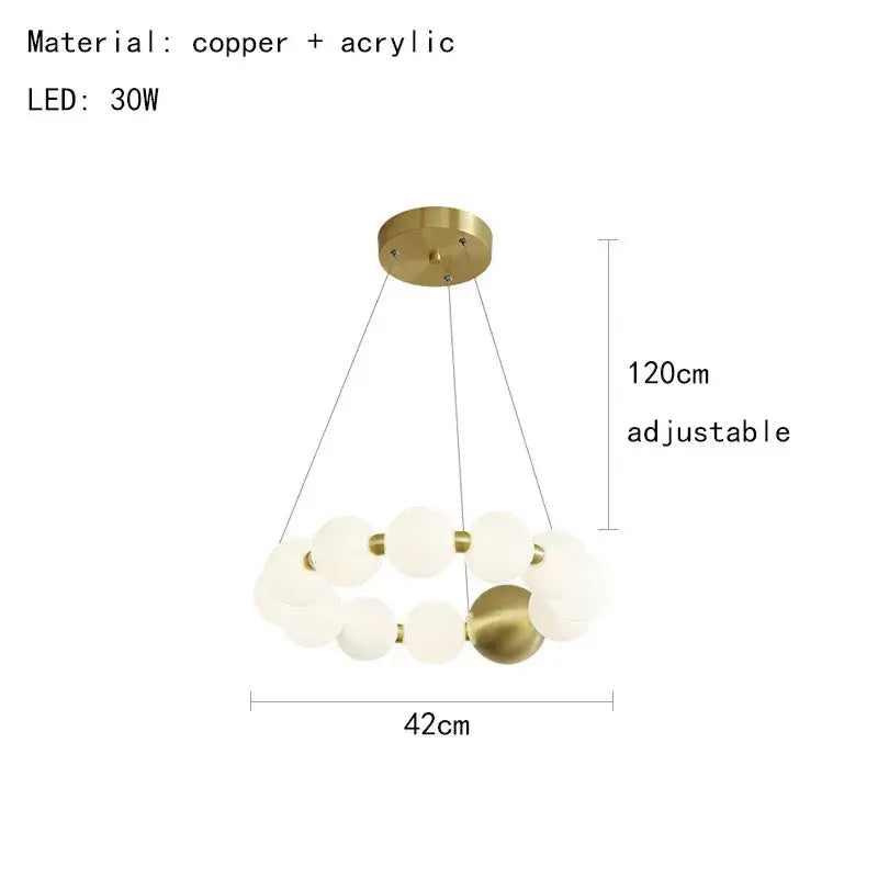 Modern brass round led pendant lights featuring gold-toned copper and acrylic spherical design with adjustable height for dining room decorbites brass round