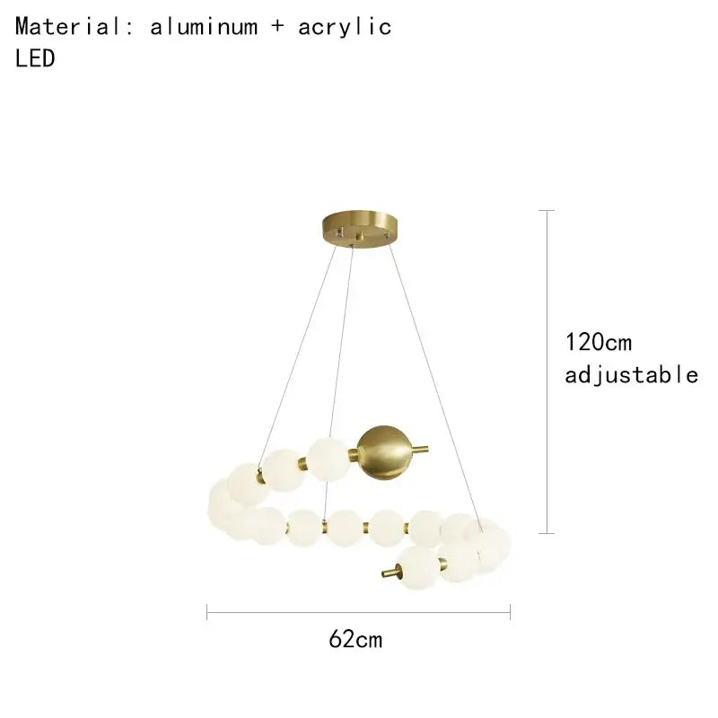 Modern brass round led pendant lights feature a gold-toned brass round led chandelier with frosted acrylic spheres decorbites brass round