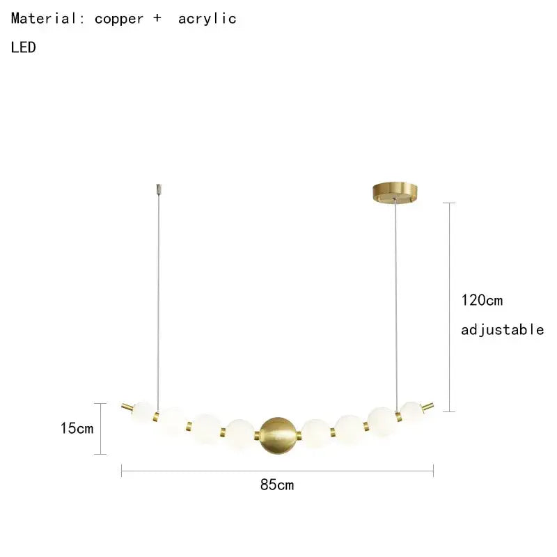 Modern brass round led pendant lights featuring brass-finished copper and frosted glass bulbs for dining room decorbites brass round