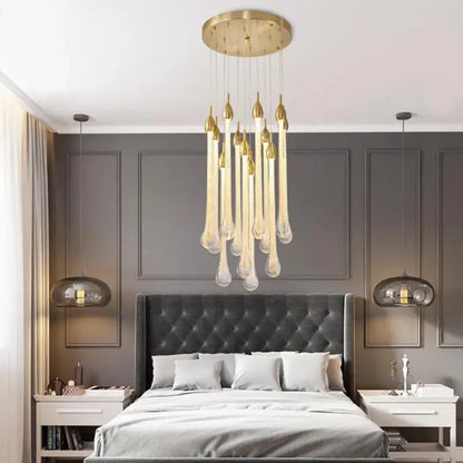 Modern brass round stairs led chandelier with gold-toned circular fixture and teardrop glass pendants for villa dining decorbites 3w round