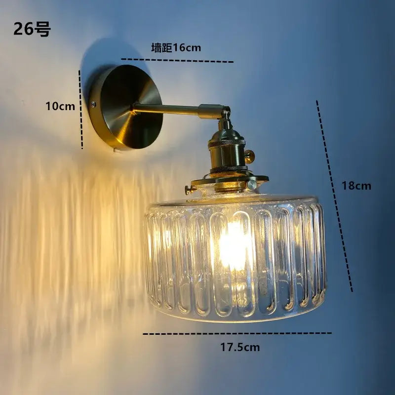 Modern brass ruffled clear glass led wall sconce featuring vintage-style brass and decorbites clear glass shade for bathroom decor