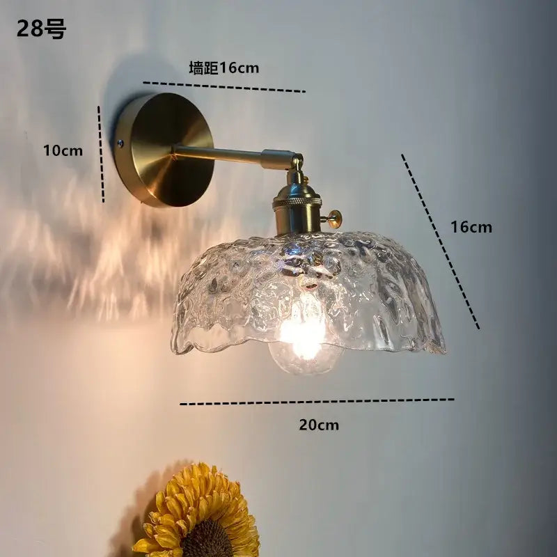 Modern brass ruffled clear glass led wall sconce with antique brass finish and decorbites clear glass shade for bathroom lighting