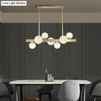 Modern brass spherical glass island ceiling light with gold-toned chandelier and frosted glass globe bulbs 220v-240v