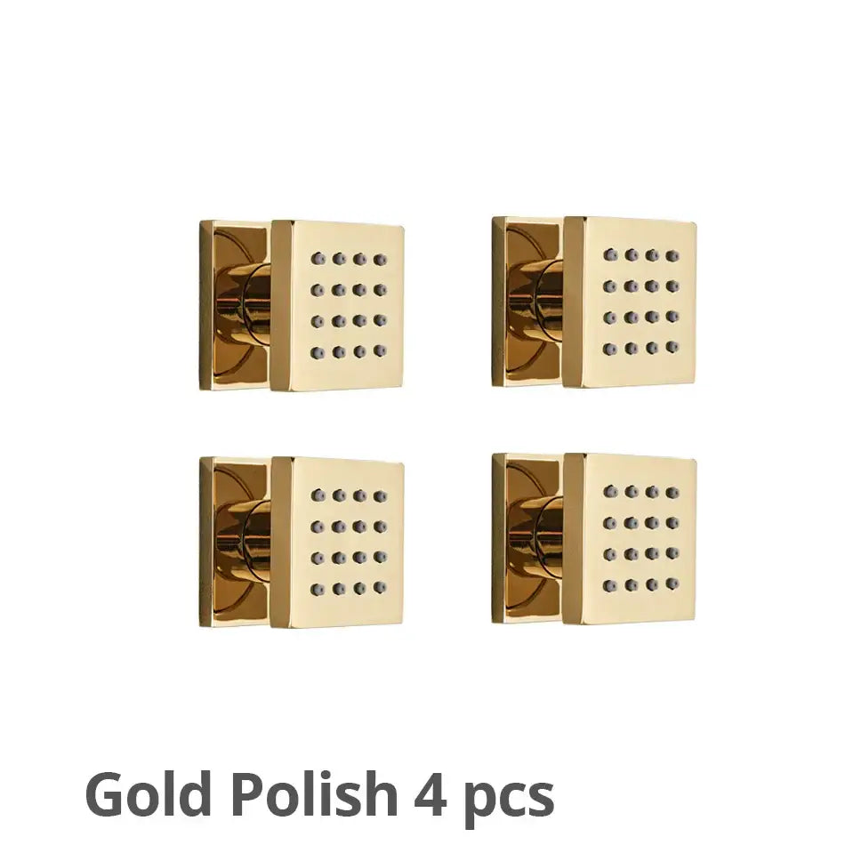 Modern brass square body shower jets with gold-polished finish and grid of small circular massage nozzles for bathroom decorbites