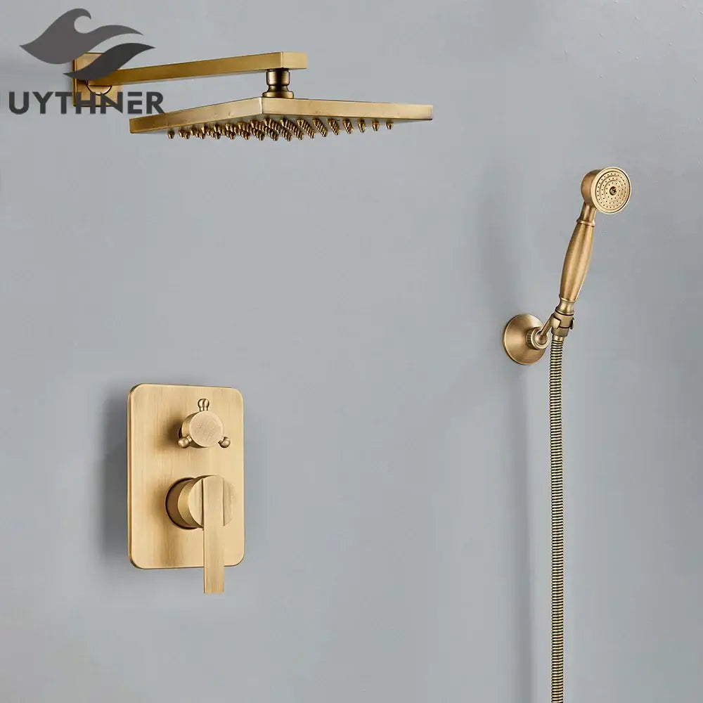 Modern brass square rainfall shower faucet set with gold finish, square rainhead, handheld spray, and wall-mounted controls