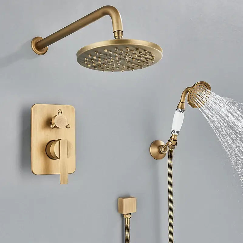 Modern brass square rainfall shower faucet set with brass finish and white ceramic accents including handheld spray head