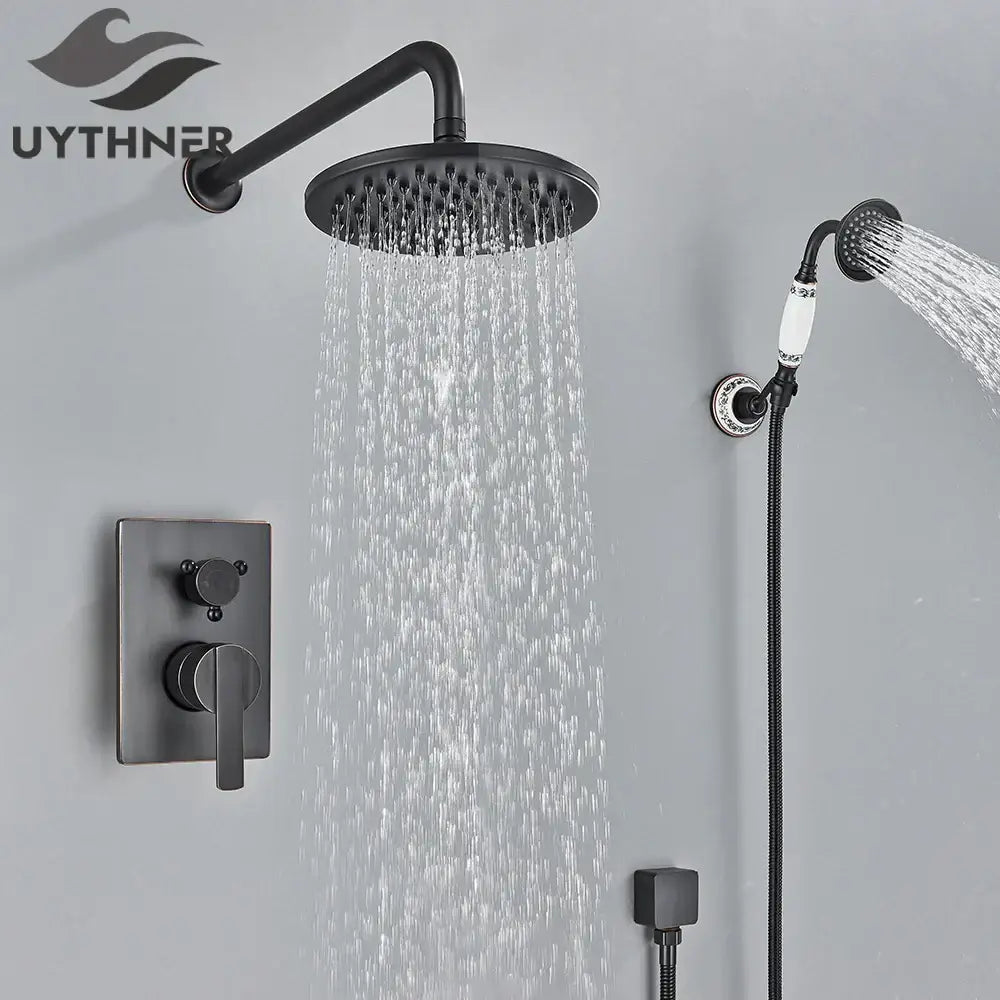 Modern brass square rainfall shower faucet set featuring a black matte rain shower head and matching handheld shower faucet set