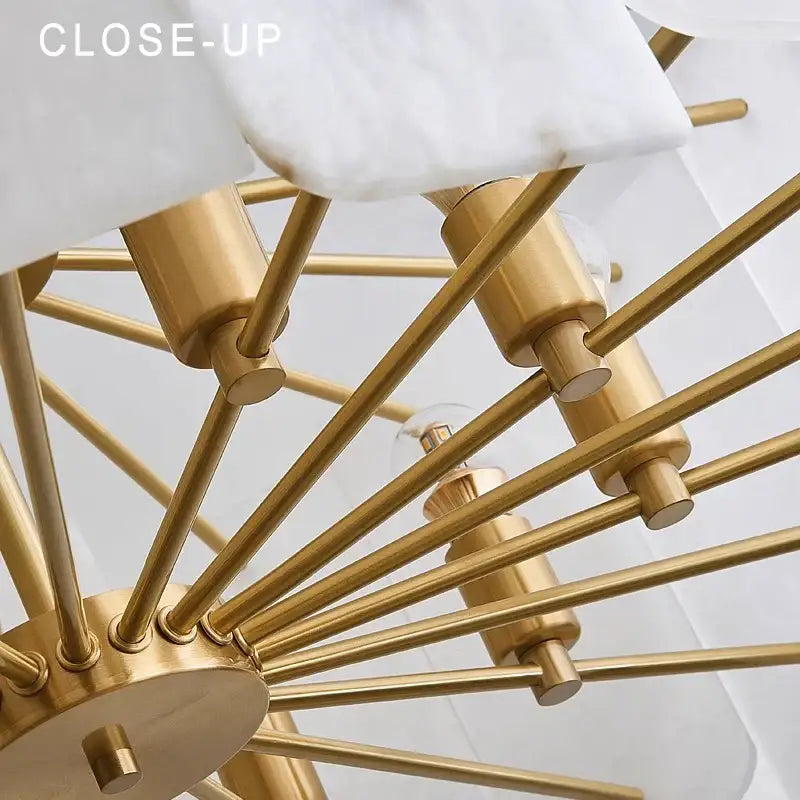 Modern brass stone pendant light with gold-toned metal and white marble accents for dining room decorbites brass stone pendant