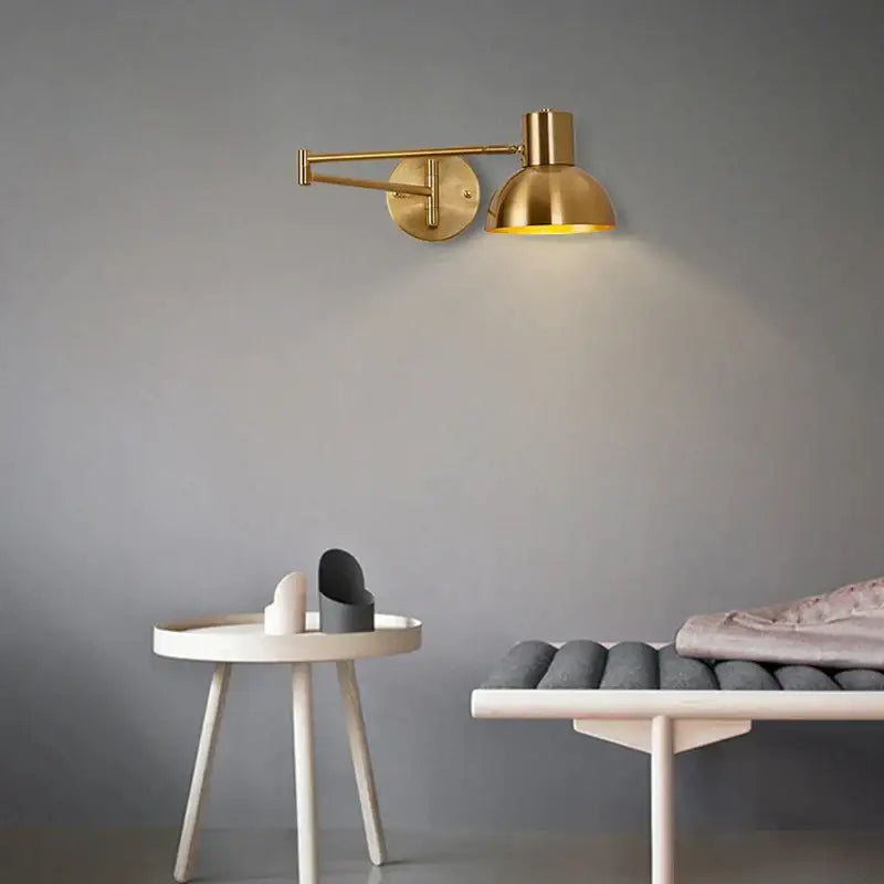 Modern brass swing arm wall lamp with adjustable swing arm design and warm glow for bedroom decorbites wall lamp decor