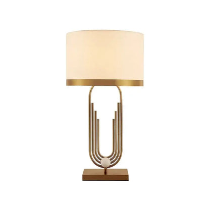 Modern brass table lamp gold paperclip light with cream fabric shade and square base for bedroom decorbites brass table