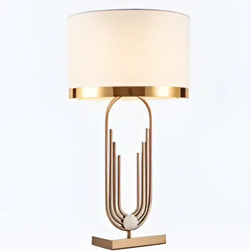 Modern brass table lamp with gold paperclip base and cream drum shade by decorbites brass for bedroom decor