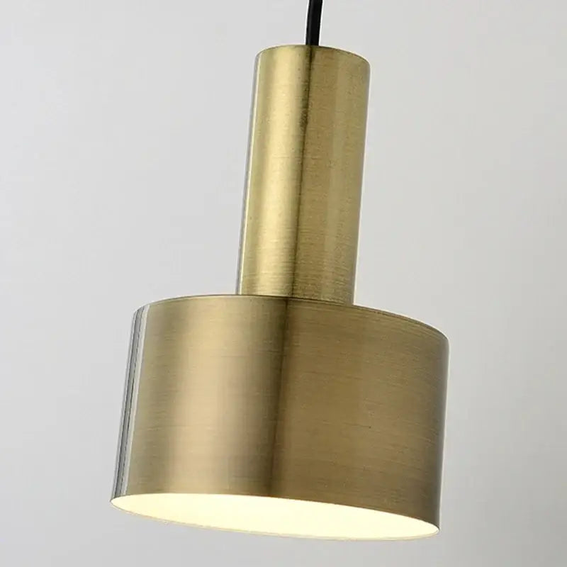 Modern brass wall lamp with a sleek brushed finish and minimalist cylindrical design for living room decorbites brass wall lamp