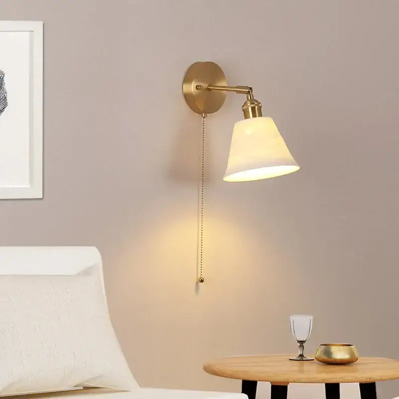 Modern brass wall lamp with adjustable arm and white bell-shaped shade ideal for bedroom reading decorbites copper led wall