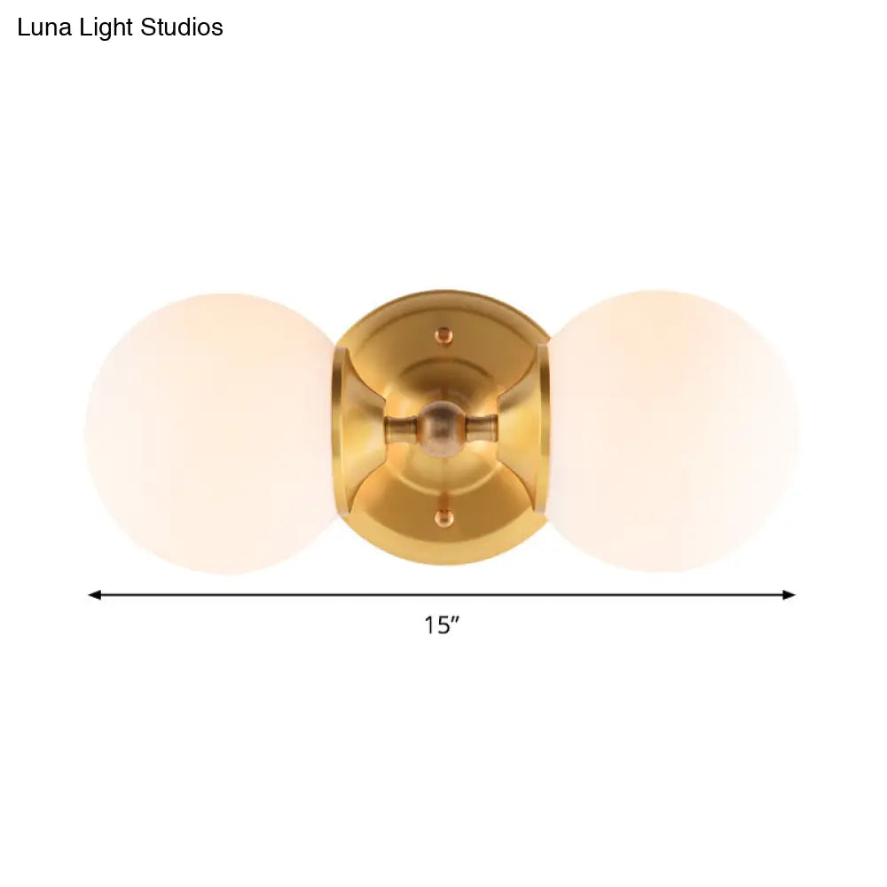 DecorBites™ DecorBites™ Modern Brass Wall Mount Sconce with 2 Milky Glass Heads