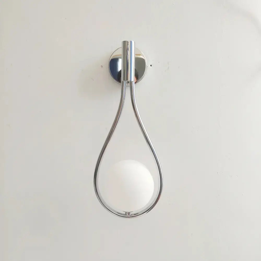 Modern brass wall sconce with chrome finish and frosted white glass shade for living room decorbites brass wall use