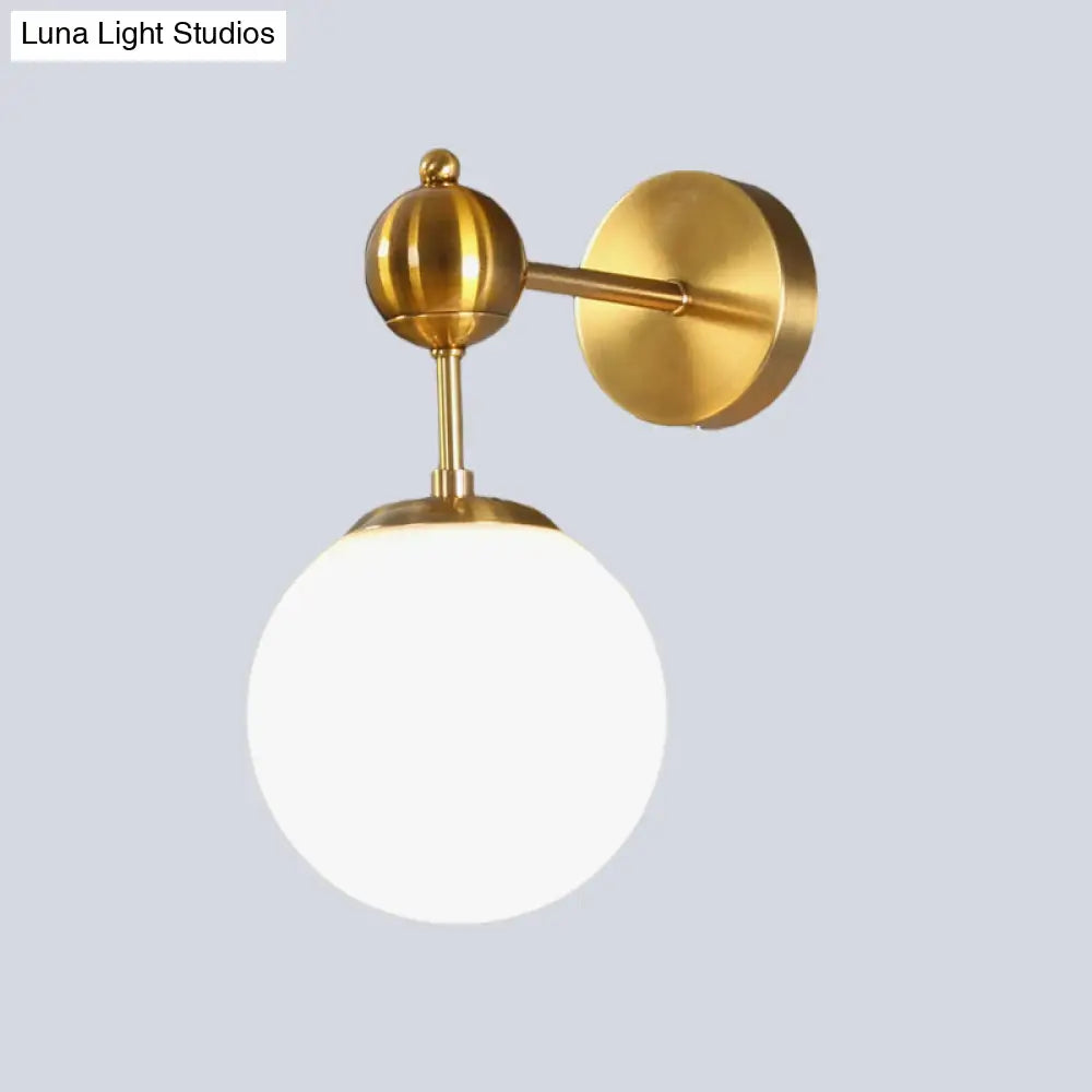 DecorBites™ DecorBites™ Modern Brass Wall Sconce Lamp with Adjustable Node - White Glass Globe Design