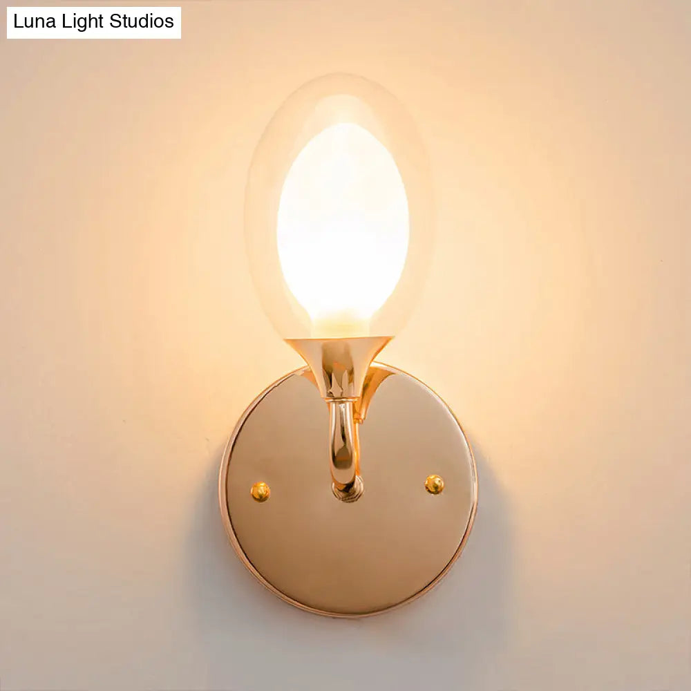 DecorBites™ DecorBites™ Modern Brass Wall Sconce with Clear Glass Shade - Oval Design for Dining Room