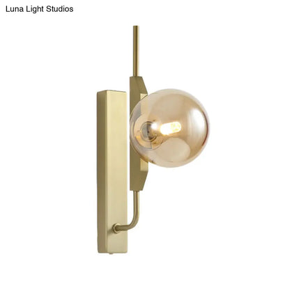 DecorBites™ DecorBites™ Modern Brass Wall Sconce with Sphere Glass Shade - LED Bedroom Lighting in Smoky/White/Amber