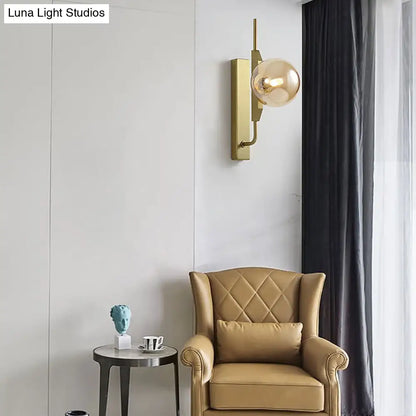 DecorBites™ DecorBites™ Modern Brass Wall Sconce with Sphere Glass Shade - LED Bedroom Lighting in Smoky/White/Amber