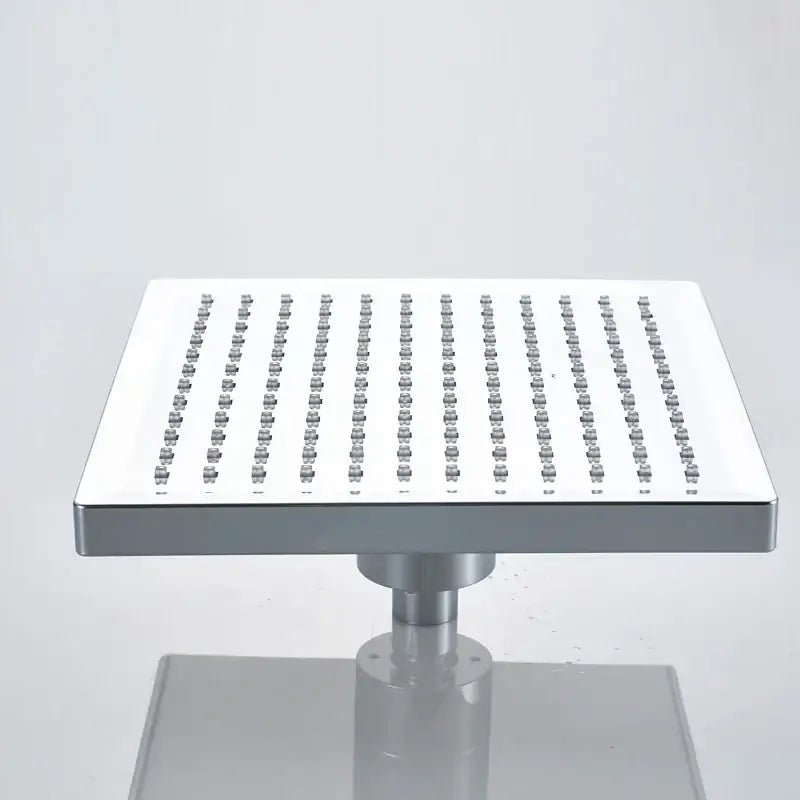 Modern bright chrome led rainfall shower head with square chrome finish and evenly spaced nozzles by decorbites bright chrome