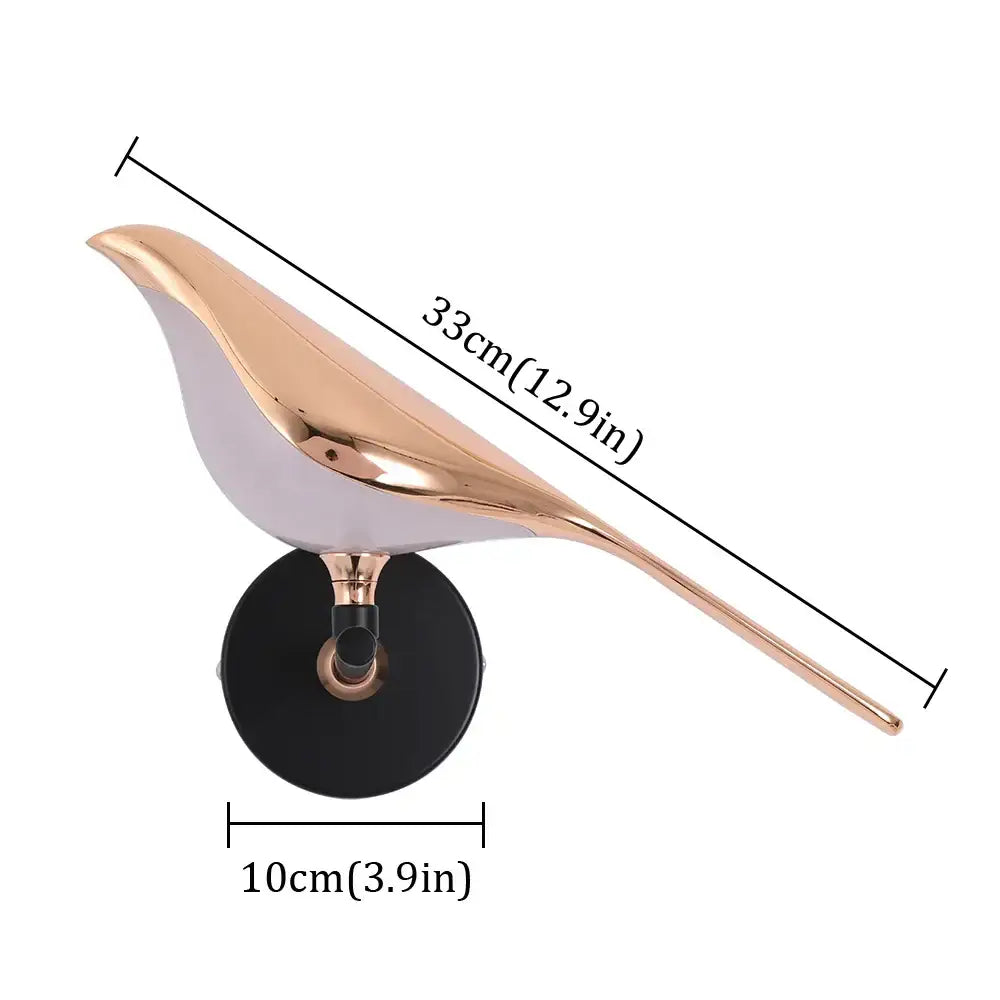 Modern bronze bird wall light pair featuring sleek rose gold metallic finish and white ceramic body for wall light decorbites bird wall decor