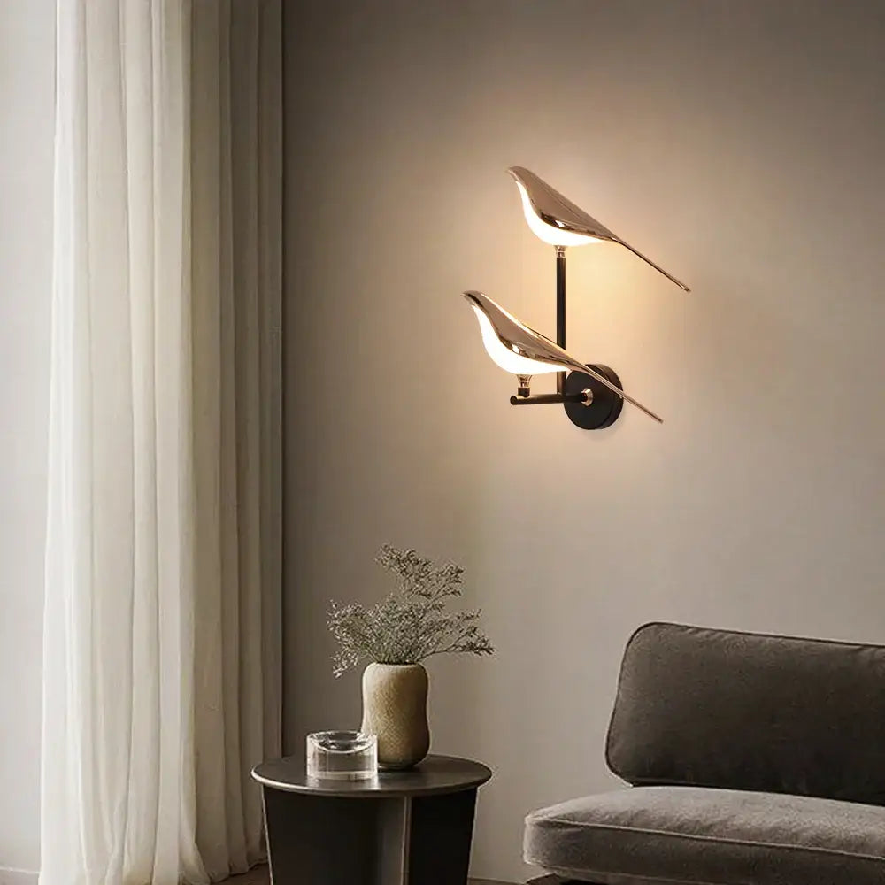 Modern bronze bird wall light pair featuring brass material and minimalist design for living room decorbites bird wall light