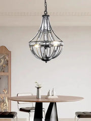 A sleek black chrome gold globe led chandelier with clear glass panels and chain suspension for modern living room decorbites bronze black