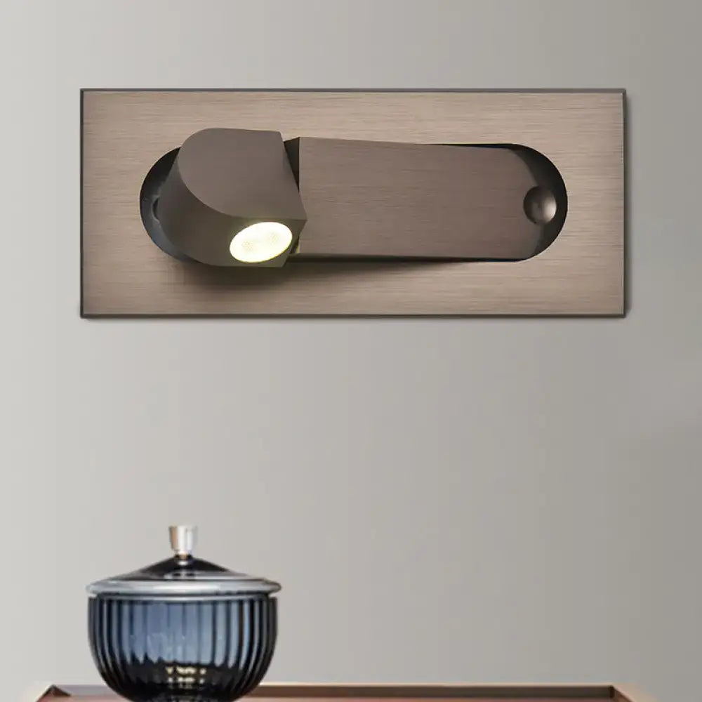 Modern bronze coffee wall lamp with brushed bronze finish and adjustable head for natural warm bedroom lighting