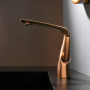 Modern bronze contemporary single-hole bathroom faucet with solid brass construction and ceramic valve core features sleek curved design