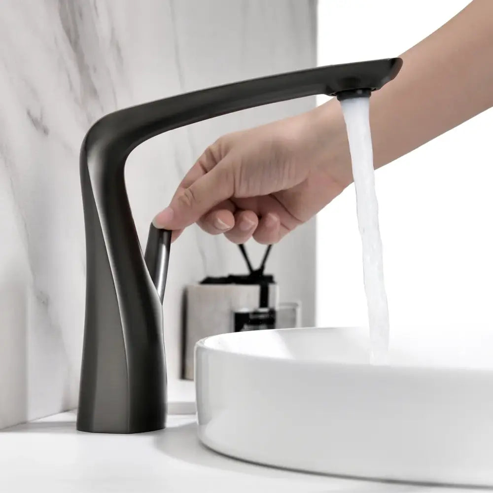Black matte modern faucet with sleek curved design solid brass contemporary single-hole ceramic valve core