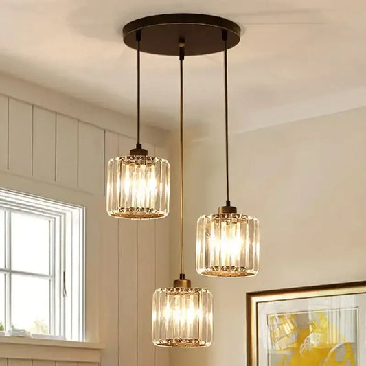 Modern bronze crystal trio pendant light with clear faceted glass shades and dark bronze fixtures for dining room decorbites crystal trio pendant