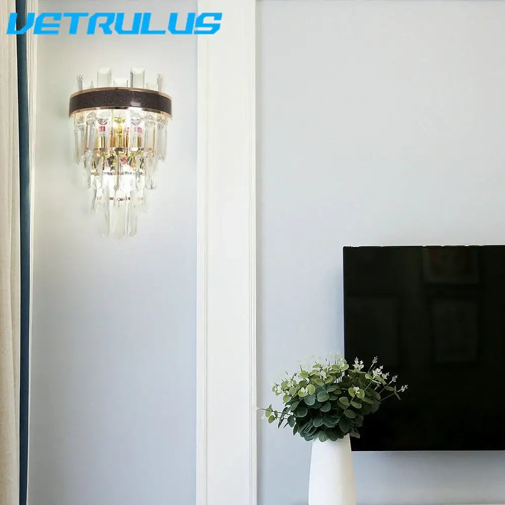 Elegant modern bronze decorbites crystal led wall light featuring crystal prisms with dark bronze rim for living room