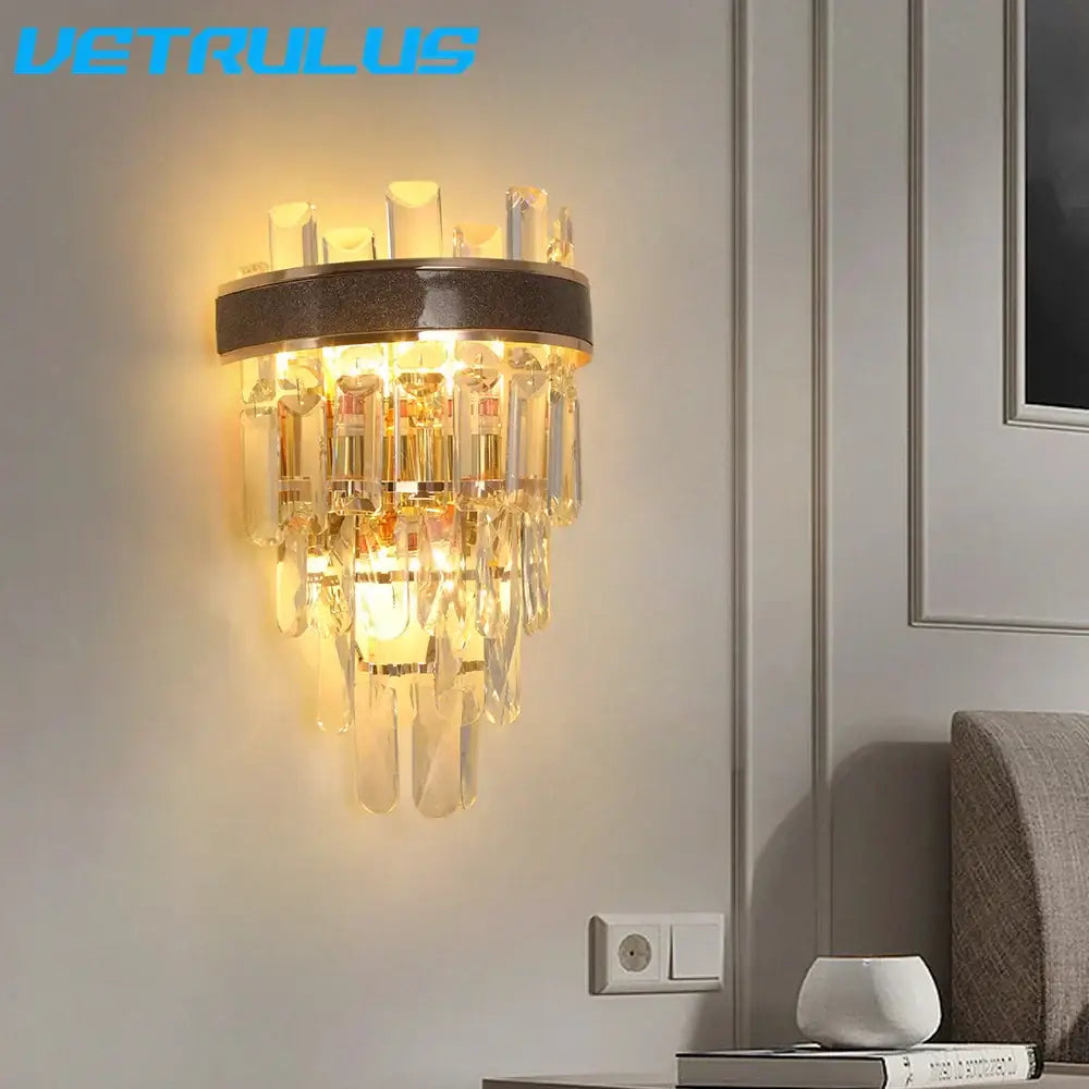 Vetrulus modern bronze decorbites crystal led wall light with circular base and cascading clear crystal prisms for living room