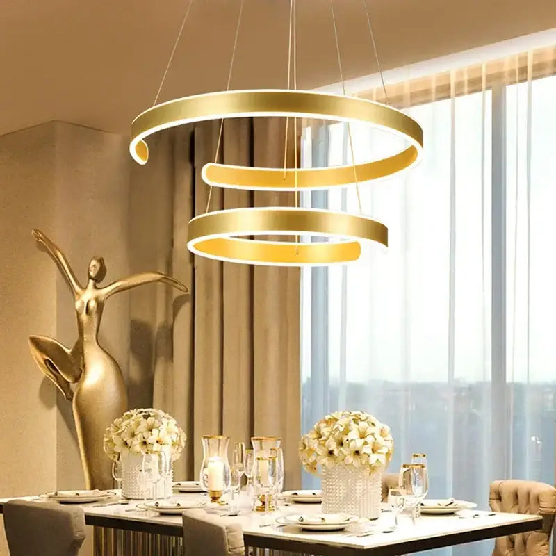 Modern bronze geometry circle rings pendant light with gold-toned spiral design and integrated LED for living room